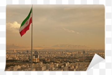 Iran Flag In The Wind Above Skyline Of Tehran Wall Mural U2022 Pixers - We Live To Change Iran Hrlri Png,Iran Flag Png